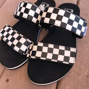 Black and white Checkered Vans slides